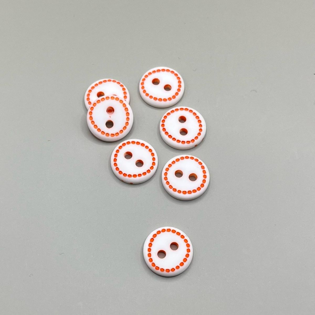 12mm — White With Orange Dots